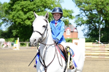 Poppy Dorise is the youngest to qualify for the Blue Chip Pony Newcomers at the prestigious Horse of the Year Show as she cruises to a win at South View
